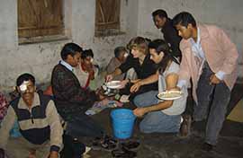 Hassan Ali and Timothy Joseph feeding FRI eye camp patients